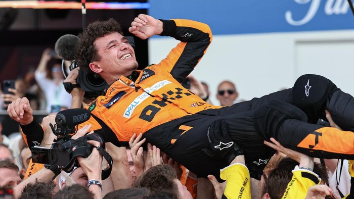 MIAMI, FLORIDA - MAY 05: Lando Norris of Great Britain and McLaren F1 Team celebrates his win in parc feme during the F1 Grand Prix of Miami at Miami International Autodrome on May 5, 2024 in Miami, United States. (Photo by Song Haiyuan/MB Media/Getty Images)