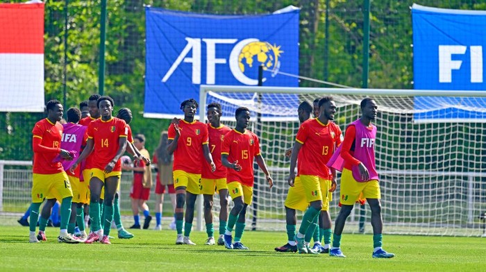 CLAIREFONTAINE-EN-YVELINES, FRANCE - MAY 09: Guinea players react after winning the Paris 2024 Olympic Games qualifier match between Indonesia U23 and Guinea U23 at Centre National du Football on May 09, 2024 in Clairefontaine-en-Yvelines, France. (Photo by Aurelien Meunier - FIFA/FIFA via Getty Images)
