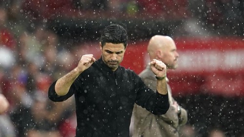 Arsenals manager Mikel Arteta reacts after winning the English Premier League soccer match between Manchester United and Arsenal at the Old Trafford Stadium in Manchester, England, Sunday, May 12, 2024. Arsenal won 1-0. (AP Photo/Dave Thompson)