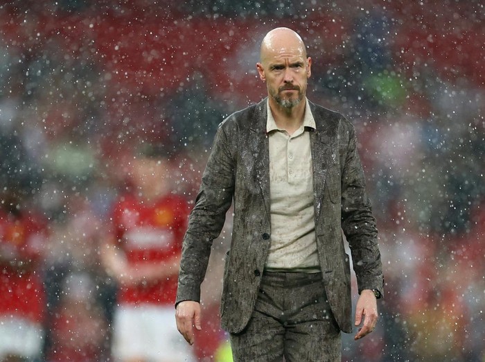 Soccer Football - Premier League - Manchester United v Arsenal - Old Trafford, Manchester, Britain - May 12, 2024 Manchester United manager Erik ten Hag looks on after the match as rain falls REUTERS/Carl Recine EDITORIAL USE ONLY. NO USE WITH UNAUTHORIZED AUDIO, VIDEO, DATA, FIXTURE LISTS, CLUB/LEAGUE LOGOS OR LIVE SERVICES. ONLINE IN-MATCH USE LIMITED TO 120 IMAGES, NO VIDEO EMULATION. NO USE IN BETTING, GAMES OR SINGLE CLUB/LEAGUE/PLAYER PUBLICATIONS. PLEASE CONTACT YOUR ACCOUNT REPRESENTATIVE FOR FURTHER DETAILS..