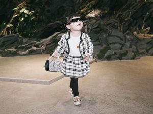 7 Foto Gemas Anak Aurel Liburan Bareng KD, Stylish Pakai Adidas hingga Gucci