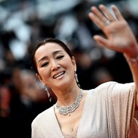 Terakhir membintangi film Leap pada 2020, Gong Li tetap terlihat memesona di usia 58 tahun.  Foto: LOIC VENANCE / AFP