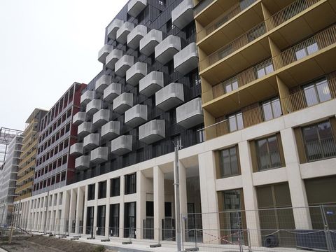 Buildings of the Olympic Village are pictured, Friday, Dec. 1, 2023 in Saint-Denis, outside Paris. The Paris 2024 Olympic Games will run from July 26 to Aug.11, 2024. (AP Photo/Michel Euler)