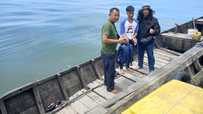 Pelaku Ismail saat diamankan pihak kepolisian.