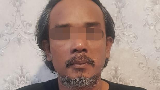 Pelaku perampokan toko ponsel di Kota Malang yang berhasil ditangkap warga.