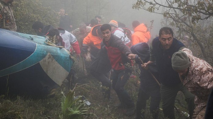 Rescue team works following a crash of a helicopter carrying Irans President Ebrahim Raisi, in Varzaqan, East Azerbaijan Province, Iran, May 20, 2024. Stringer/WANA (West Asia News Agency) via REUTERS ATTENTION EDITORS - THIS IMAGE HAS BEEN SUPPLIED BY A THIRD PARTY.