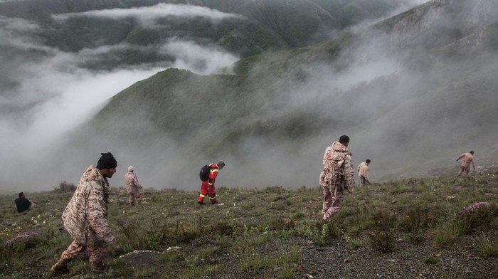 Rescue team works following a crash of a helicopter carrying Irans President Ebrahim Raisi, in Varzaqan, East Azerbaijan Province, Iran, May 20, 2024. Stringer/WANA (West Asia News Agency) via REUTERS ATTENTION EDITORS - THIS IMAGE HAS BEEN SUPPLIED BY A THIRD PARTY.