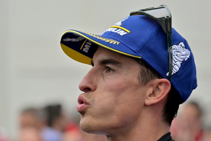 Gresini Racing MotoGPs Spanish rider Marc Marquez reacts after winning the second place of the French MotoGP Grand Prix race at the Bugatti circuit in Le Mans, northwestern France, on May 12, 2024. (Photo by LOU BENOIST / AFP)