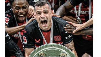 Bayer Leverkusen sepertinya mengejek Arsenal dengan memposting mantan pemain Arsenal Granit Xhaka yang juara bersama mereka. Foto: Twitter