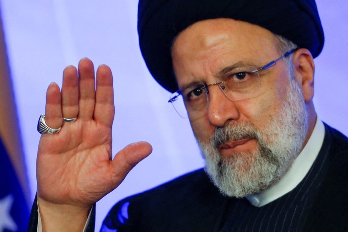 FILE PHOTO: Iranian President Ebrahim Raisi gestures during a meeting with Venezuelas President Nicolas Maduro at the Miraflores Palace, in Caracas, Venezuela June 12, 2023. REUTERS/Leonardo Fernandez Viloria/File Photo