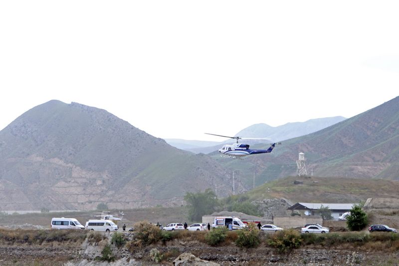 In this photo provided by Islamic Republic News Agency, IRNA, the helicopter carrying Iranian President Ebrahim Raisi takes off at the Iranian border with Azerbaijan after President Raisi and his Azeri counterpart Ilham Aliyev inaugurated dam of Qiz Qalasi, or Castel of Girl in Azeri, Iran, Sunday, May 19, 2024. A helicopter carrying President Raisi suffered a 