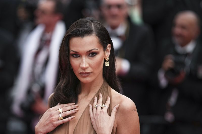 Bella Hadid poses for photographers upon arrival at the premiere of the film 'The Apprentice' at the 77th international film festival, Cannes, southern France, Monday, May 20, 2024. (Photo by Daniel Cole/Invision/AP)