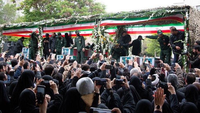 People attend a funeral ceremony for the late Iranian President Ebrahim Raisi in Tabriz, East Azerbaijan Province, Iran, May 21, 2024. Stringer/WANA (West Asia News Agency) via REUTERS ATTENTION EDITORS - THIS IMAGE HAS BEEN SUPPLIED BY A THIRD PARTY.   ATTENTION EDITORS - THIS PICTURE WAS PROVIDED BY A THIRD PARTY