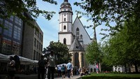 Pemandangan umum menunjukkan Gereja St.Thomas. Di sela-sela menonton Piala Eropa 2024, bisa banget lho sambil berkeliling menikmati wisata di kota Leipzig.