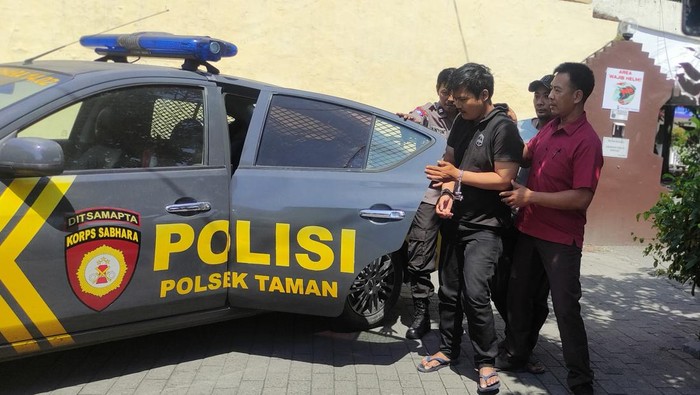 Pelaku saat ditangkap