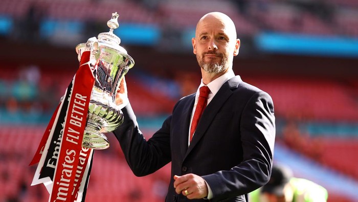 LONDON, ENGLAND - MAY 25: Erik ten Hag, Manager of Manchester United, celebrates with the Emirates FA Cup Trophy after his teams victory after the Emirates FA Cup Final match between Manchester City and Manchester United at Wembley Stadium on May 25, 2024 in London, England. (Photo by Ben Hoskins - The FA/The FA via Getty Images)