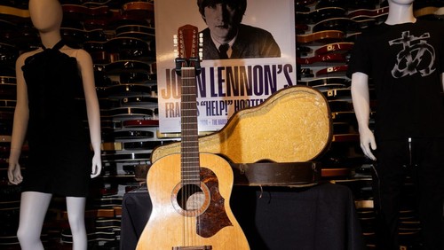 Guitars and outfits of various music icons are displayed during the Julien's Music Icons Auction preview at Hard Rock Cafe in New York City, U.S., May 21, 2024.   REUTERS/Caitlin Ochs