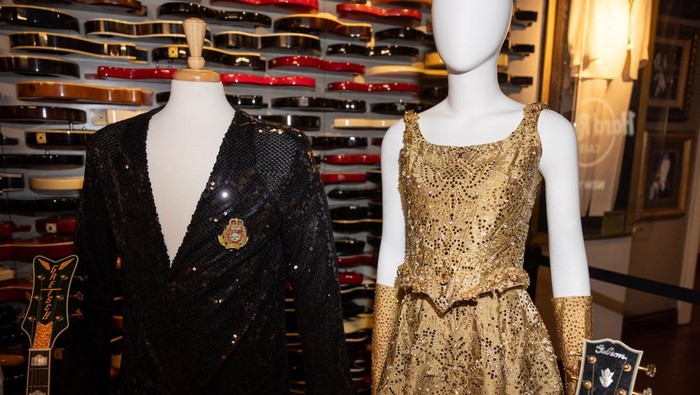 Guitars and outfits of various music icons are displayed during the Julien's Music Icons Auction preview at Hard Rock Cafe in New York City, U.S., May 21, 2024.   REUTERS/Caitlin Ochs