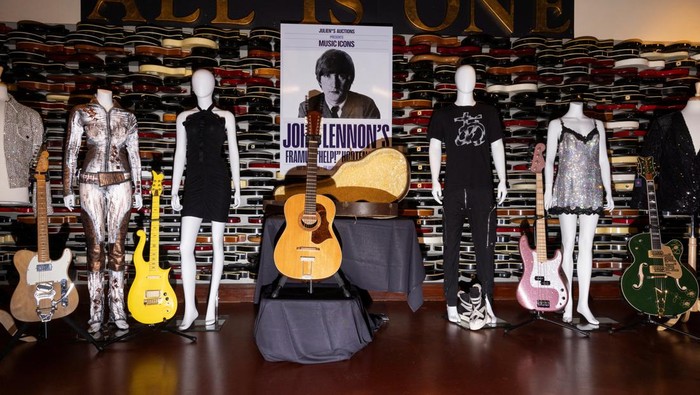 Guitars and outfits of various music icons are displayed during the Julien's Music Icons Auction preview at Hard Rock Cafe in New York City, U.S., May 21, 2024.   REUTERS/Caitlin Ochs