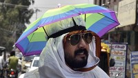 Negara bagian Punjab dan Haryana yang berdekatan juga mengalami peningkatan suhu, dengan satu tempat di Rajasthan mencapai angka 50 derajat Celcius (122 derajat Fahrenheit). AP/Dinesh Gupta