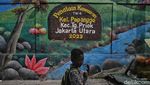 Edukasi Pelestarian Lingkungan hingga Biota Laut lewat Mural di Jakut