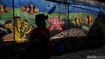 Edukasi Pelestarian Lingkungan hingga Biota Laut lewat Mural di Jakut