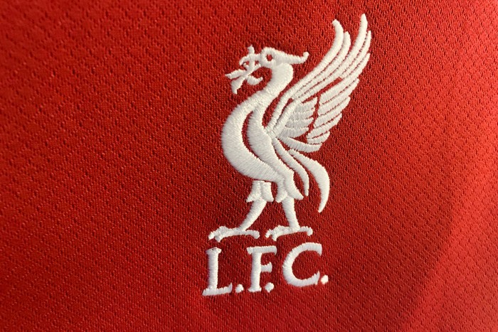 Liverpool F.C. logo is seen on a football jersey in this illustration photo taken in a store in Krakow, Poland on May 6, 2023. (Photo by Jakub Porzycki/NurPhoto via Getty Images)