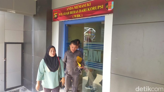 Siti Aminah saat mendatangi Bidpropam Polda Sumsel