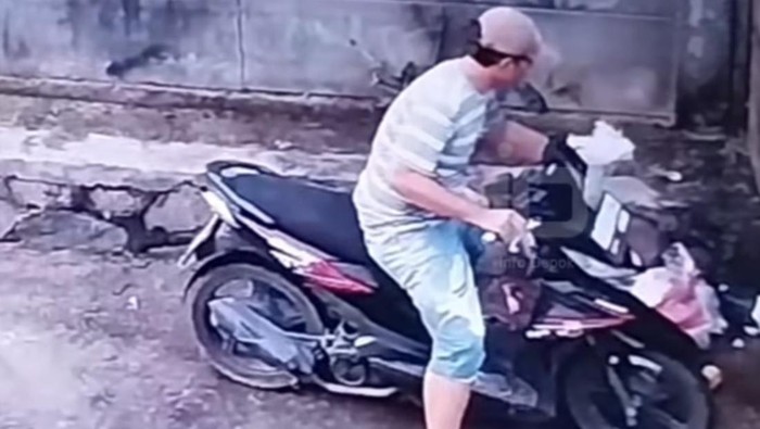 Warga terekam CCTV buang sampah sembarangan di gang Omdo Depok