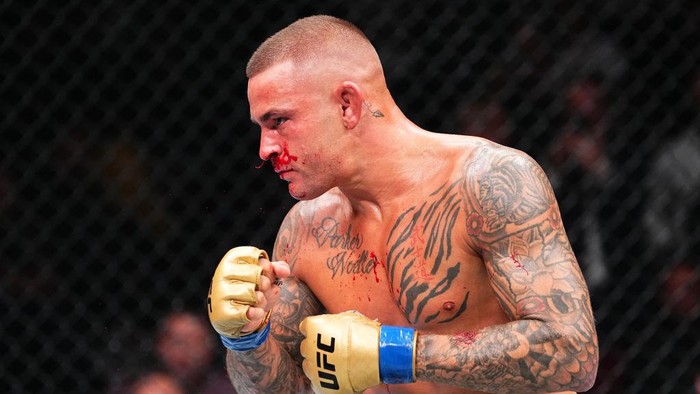 NEWARK, NEW JERSEY - JUNE 01: Dustin Poirier battles Islam Makhachev of Russia in the UFC lightweight championship fight during the UFC 302 event at Prudential Center on June 01, 2024 in Newark, New Jersey. (Photo by Jeff Bottari/Zuffa LLC via Getty 