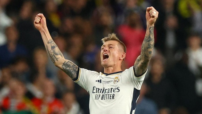 Soccer Football - Champions League - Final - Borussia Dortmund v Real Madrid - Wembley Stadium, London, Britain - June 1, 2024 Real Madrids Toni Kroos celebrates their second goal scored by Vinicius Junior REUTERS/Lee Smith