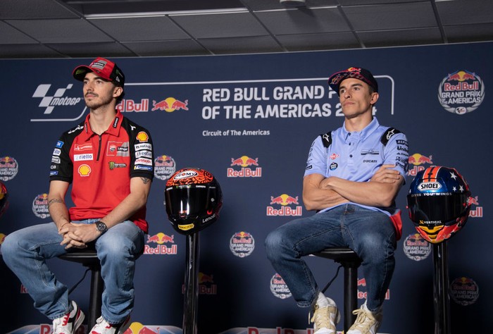 AUSTIN, TEXAS - APRIL 11:  Francesco Bagnaia of Italy and Ducati Lenovo Team (L) and Marc Marquez of Spain and Gresini Racing MotoGP look on during the press conference pre-event during the MotoGP Of The Americas - Previews at Circuit of The Americas on April 11, 2024 in Austin, Texas.  (Photo by Mirco Lazzari gp/Getty Images)