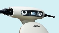Secara desain, tampilan skuter listrik ini cukup unik. Desain headlamp-nya memanjang dengan lampu proyektor dan lampu sein LED membentuk wajah robot. Desain fairing di depan tampak bersih dan elegan. Kemudian joknya  menggunakan model dua tingkat. Pada jok penumpang diberi sandaran kecil. Foto: Dok. Wuyang Honda
