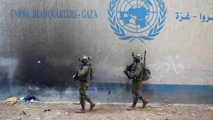 A picture taken during a media tour organized by the Israeli army on February 8, 2024, shows Israeli soldiers inside an evacuated compound of UNRWA in Gaza City. (AFP)