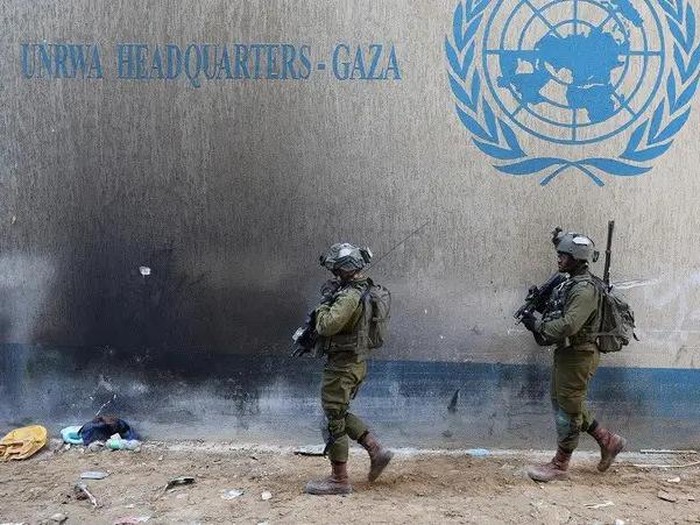 A picture taken during a media tour organized by the Israeli army on February 8, 2024, shows Israeli soldiers inside an evacuated compound of UNRWA in Gaza City. (AFP)