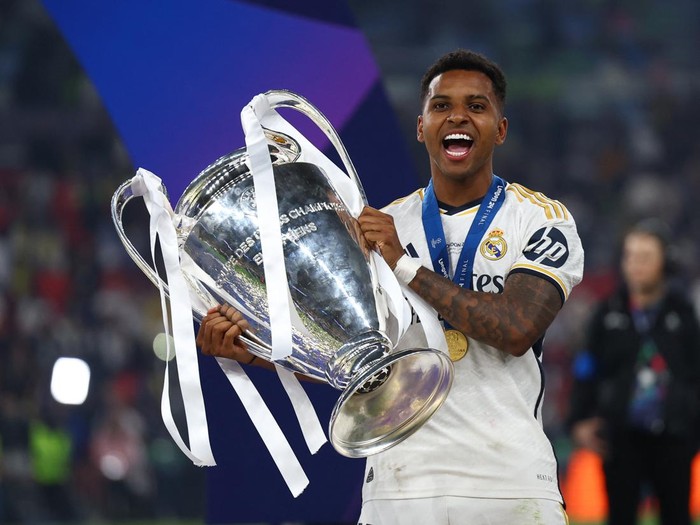 Soccer Football - Champions League - Final - Borussia Dortmund v Real Madrid - Wembley Stadium, London, Britain - June 1, 2024 Real Madrids Rodrygo celebrates with the trophy after winning the Champions League REUTERS/Hannah Mckay
