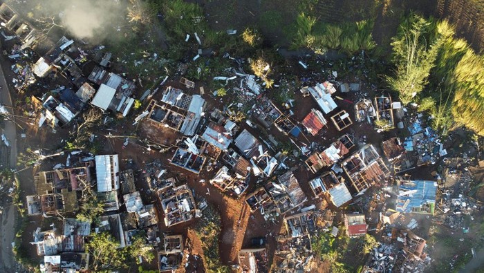 People sift through the remains of their homes damaged by a tornado in Tongaat, South Africa, June 4, 2024. REUTERS/Rogan Ward