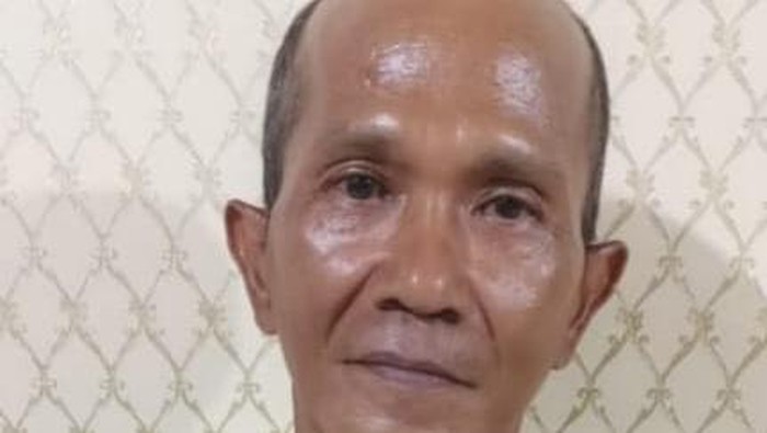 Untung yang ancam dan aniaya tetangganya saat diamankan polisi.