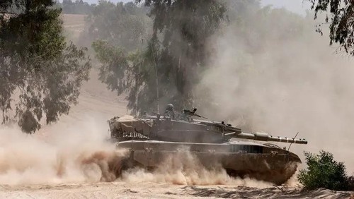 An Israeli army tank takes position in an area of Israels southern border with the Gaza Strip on June 2, 2024, amid the ongoing conflict between Israel and the Palestinian militant group Hamas. (AFP)