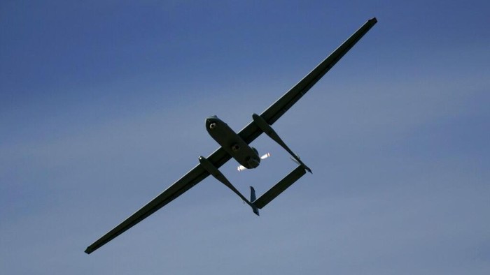 FILE - In this March 7, 2007, file photo, the Israeli army Heron TP drone, also known locally as the Eitan, flies during a display at the Palmahim Air Force Base in Palmahim, Israel. Egyptian security officials said Friday, Aug. 9, 2013, an Israeli drone fired a missile in the northern Sinai peninsula, killing several suspected Islamic militants and destroying a rocket launcher. (AP Photo/Ariel Schalit, File)