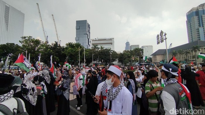 Aksi bela Palestina di Monas, Jakpus, Minggu (9/6/2024). (Fawdi/detikcom)