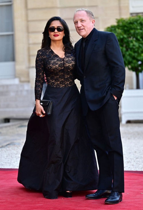 PARIS, FRANCE - JUNE 8:   US-Mexican actress Salma Hayek (L) and French businessman François-Henri Pinault (R)  to attend a official state dinner as part of US President's state visit to France, at the Presidential Elysee Palace in Paris on June 8, 2024 in Paris, France. U.S. President Joe Biden is in France to commemorate the 80th anniversary of the invasion of Normandy and to emphasize the continued role of the United States in helping to protect democratic values in Europe. (Photo by Christian Liewig - Corbis/Corbis via Getty Images)