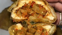 Tahu Huha milik TikToker Farida Zulfa sedang viral karena tahu pedas aneka isian. Tahu ini bisa dibeli di Gandaria City kisaran harganya dari Rp 27.000 per 3 buah. Foto: Visual/Site Culinary