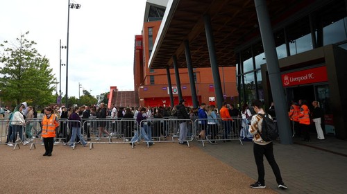 People leave the club shop at Anfield Stadium after an early merchandise release for Taylor Swift fans, in Liverpool, Britain June 12, 2024. REUTERS/Molly Darlington