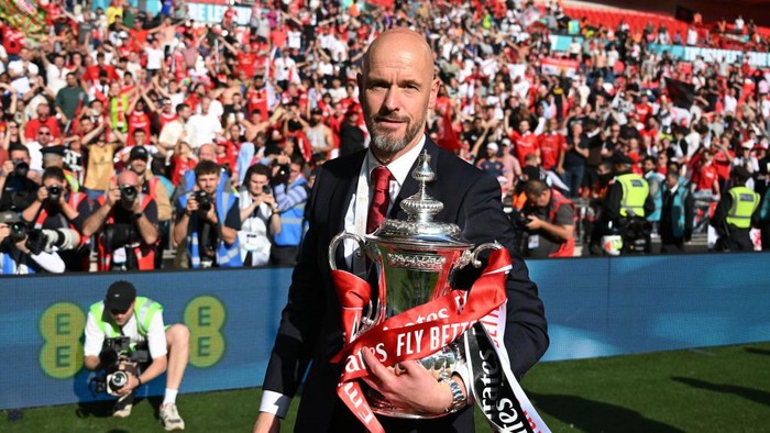 LONDON, ENGLAND - MAY 25: Erik ten Hag, manager of Manchester United looks on with the FA Cup trophy after the Emirates FA Cup Final match between Manchester City and Manchester United at Wembley Stadium on May 25, 2024 in London, England. (Photo by Michael Regan - The FA/The FA via Getty Images)