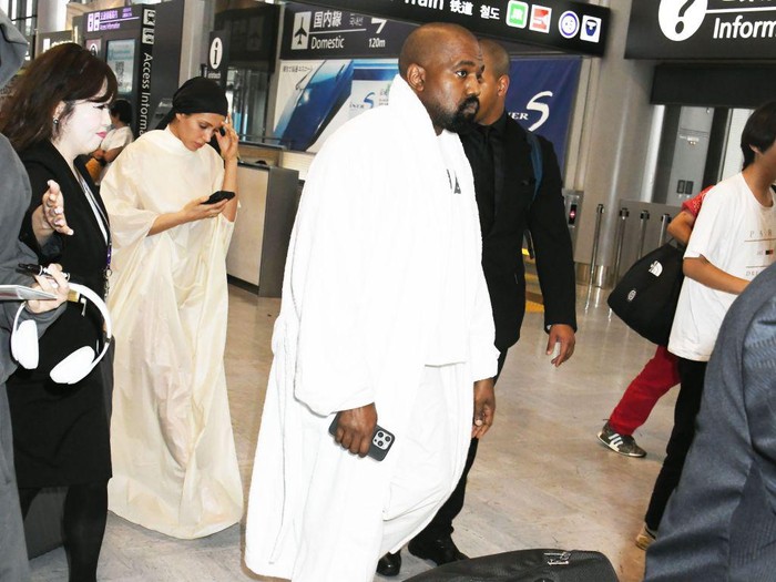 NARITA, JAPAN - JUNE 09: Bianca Censori and Kanye West are seen upon arrival at Narita International Airport on June 09, 2024 in Narita, Japan. (Photo by Jun Sato/WireImage)
