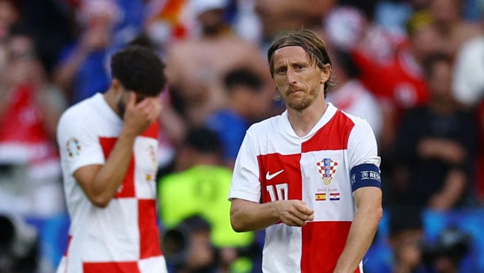 Soccer Football - Euro 2024 - Group B - Spain v Croatia - Berlin Olympiastadion, Berlin, Germany - June 15, 2024 Croatias Luka Modric looks dejected after Spains Dani Carvajal scored their third goal REUTERS/Kacper Pempel