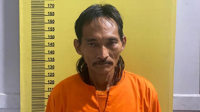 Pelaku Bismar usai ditangkap polisi (Foto: Dok. Polres Rohil)