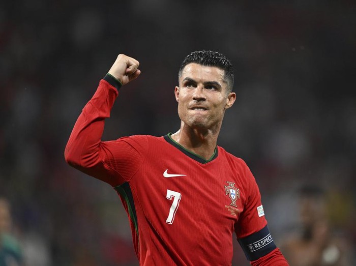 Portugals Cristiano Ronaldo raises a fist after a Group F match between Portugal and Czech Republic at the Euro 2024 soccer tournament in Leipzig, Germany, Tuesday, June 18, 2024 (Robert Michael/dpa via AP)