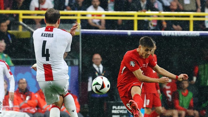 Soccer Football - Euro 2024 - Group F - Turkey v Georgia - Dortmund BVB Stadion, Dortmund, Germany - June 18, 2024 Turkeys Arda Guler scores their second goal REUTERS/Wolfgang Rattay